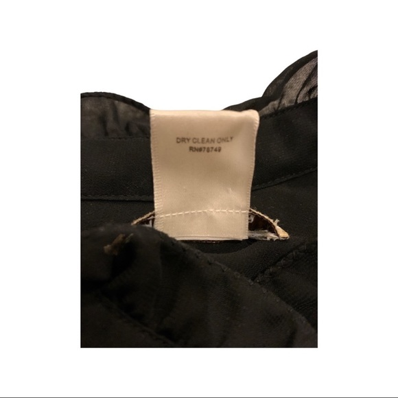 Arden B Sleeveless Ruffle button Down Tunic Top
Size: XS
Color: Black - Picture 7 of 9